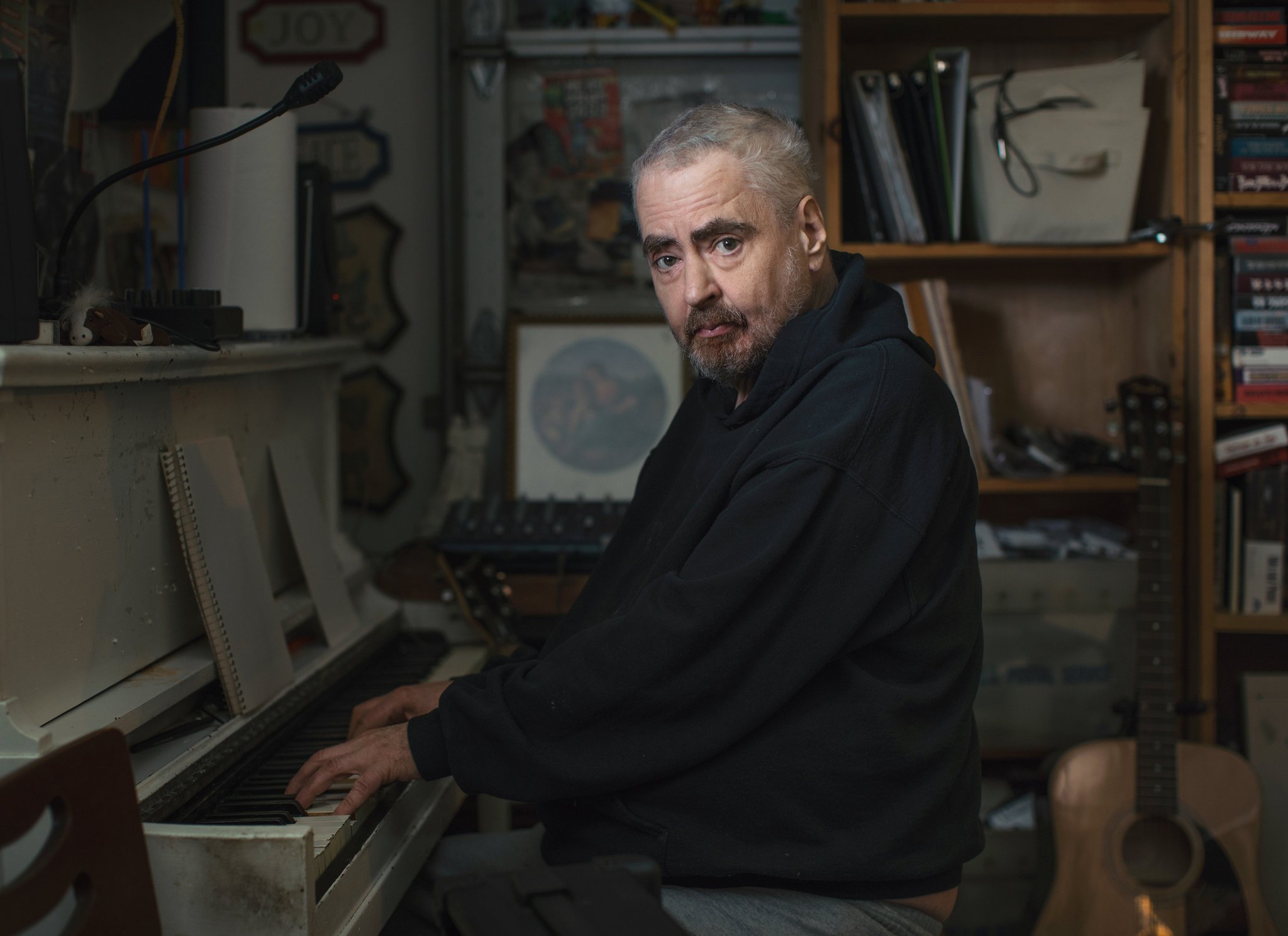 Daniel Johnston - playing piano, photo by Bryan Shutmaat